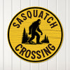 Personalized Sasquatch Crossing Round Metal Sign – Rustic Woodland Decor, Perfect Gift for Bigfoot Enthusiasts - Image 1